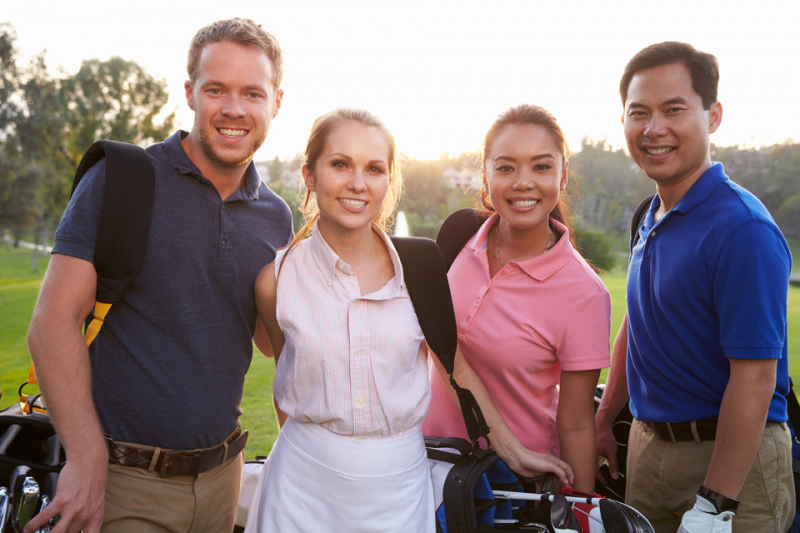 Stock photo of four golfers